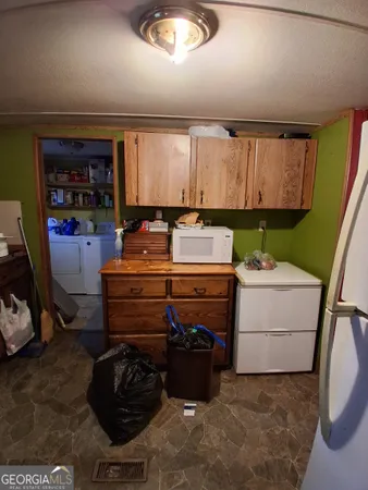 a room with furniture and a window