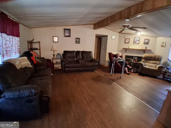 a living room with furniture and a couch