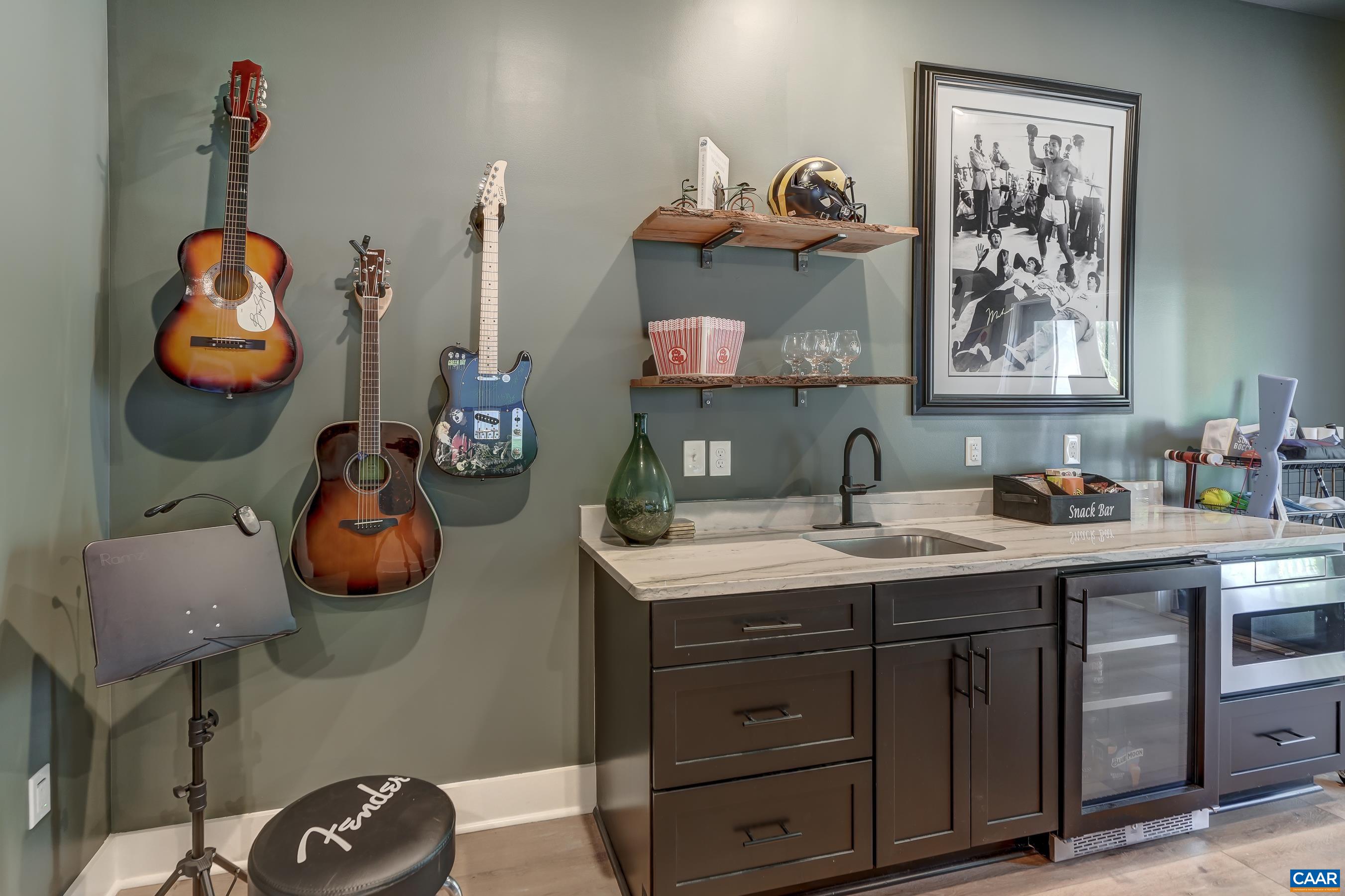 3327 Rowcross Street Crozet, VA 22932 - Photo 47 of 63 Wet bar in basement with wine cooler.