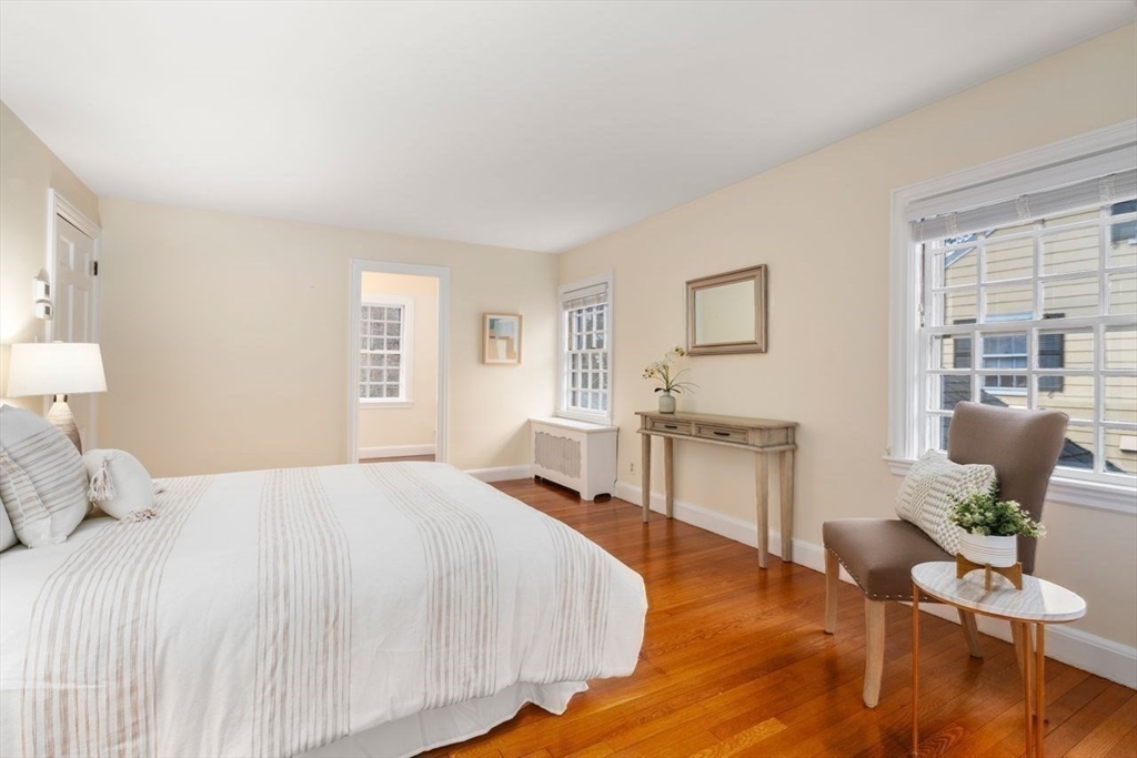 36 Rutledge Road Belmont, MA 02478 - Photo 13 of 23 a bedroom with a bed and wooden floor