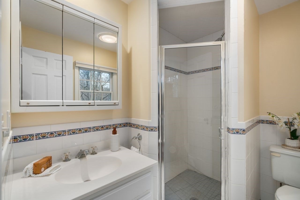 36 Rutledge Road Belmont, MA 02478 - Photo 14 of 23 a bathroom with a bathtub and shower