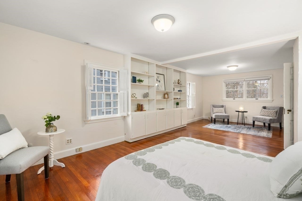 36 Rutledge Road Belmont, MA 02478 - Photo 15 of 23 a spacious bedroom with a bed and a couch