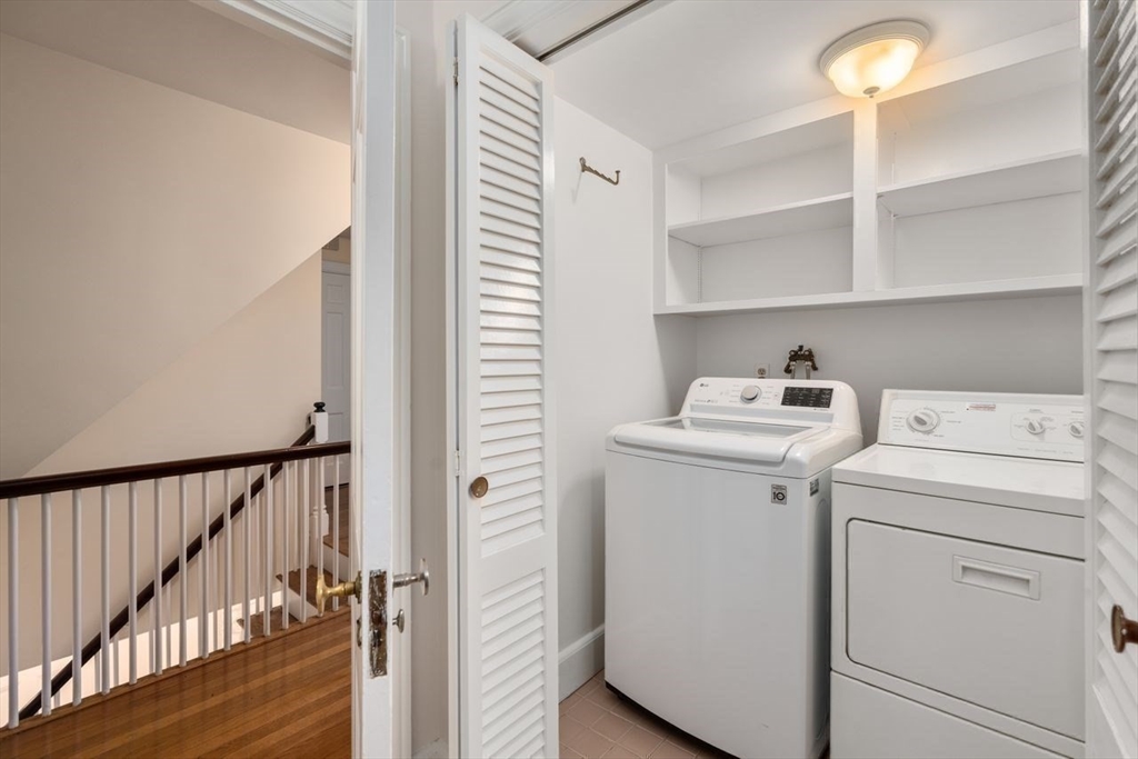 36 Rutledge Road Belmont, MA 02478 - Photo 20 of 23 a view of storage and utility room with washer and dryer