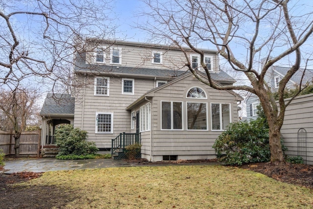 36 Rutledge Road Belmont, MA 02478 - Photo 21 of 23 a front view of a house with a garden