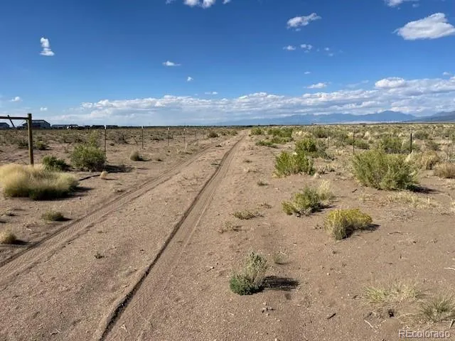 a view of water heater with a view of outdoor space