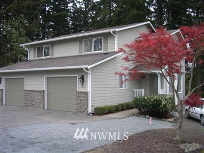 7205 B Lower Ridge Road, Unit B Everett, WA 98203 - Photo 1 of 1 front view of a house with a street