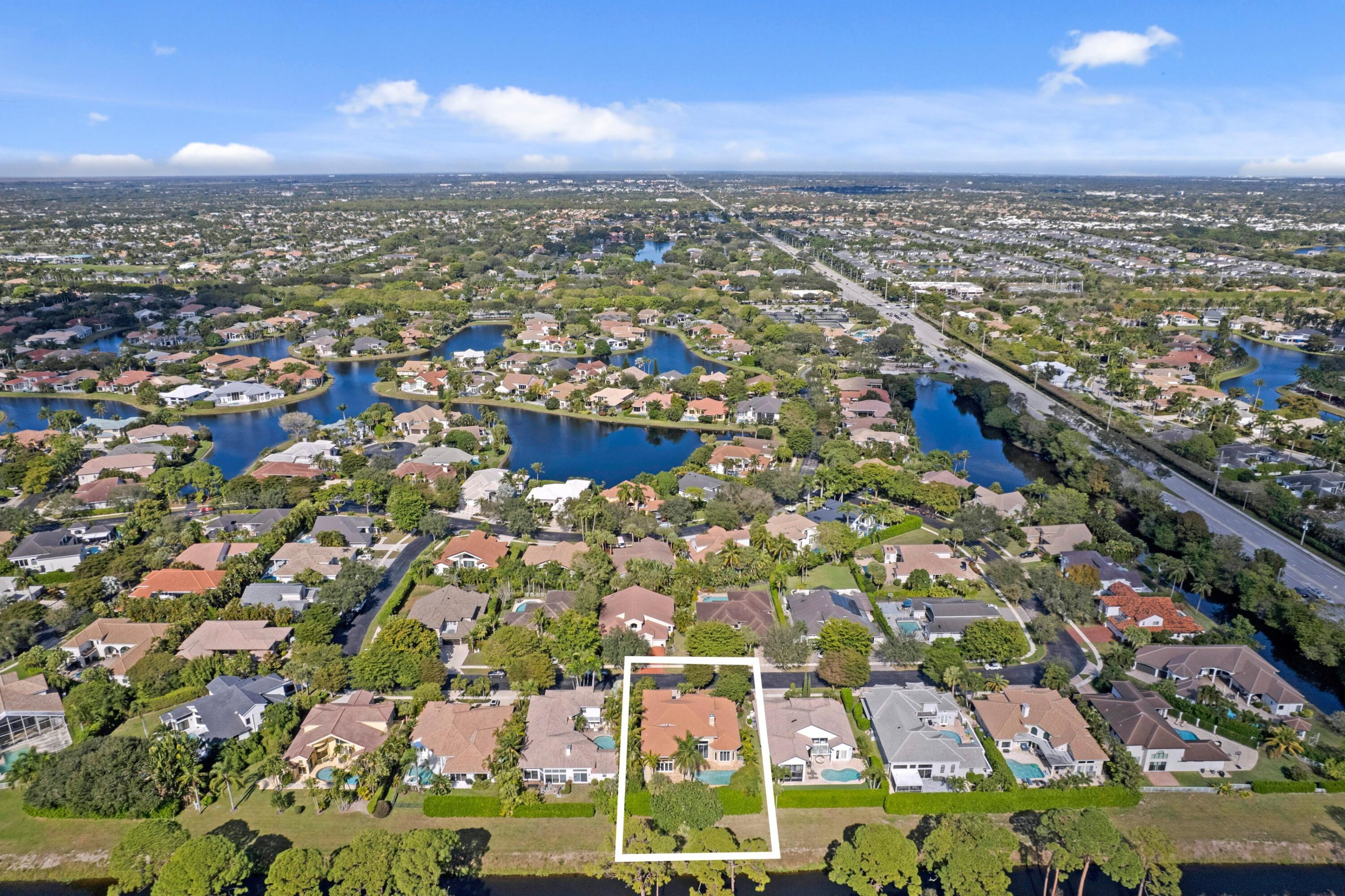 3054 Northwest 60th Street Boca Raton, FL 33496 - Photo 23 of 48 an aerial view of residential houses with outdoor space