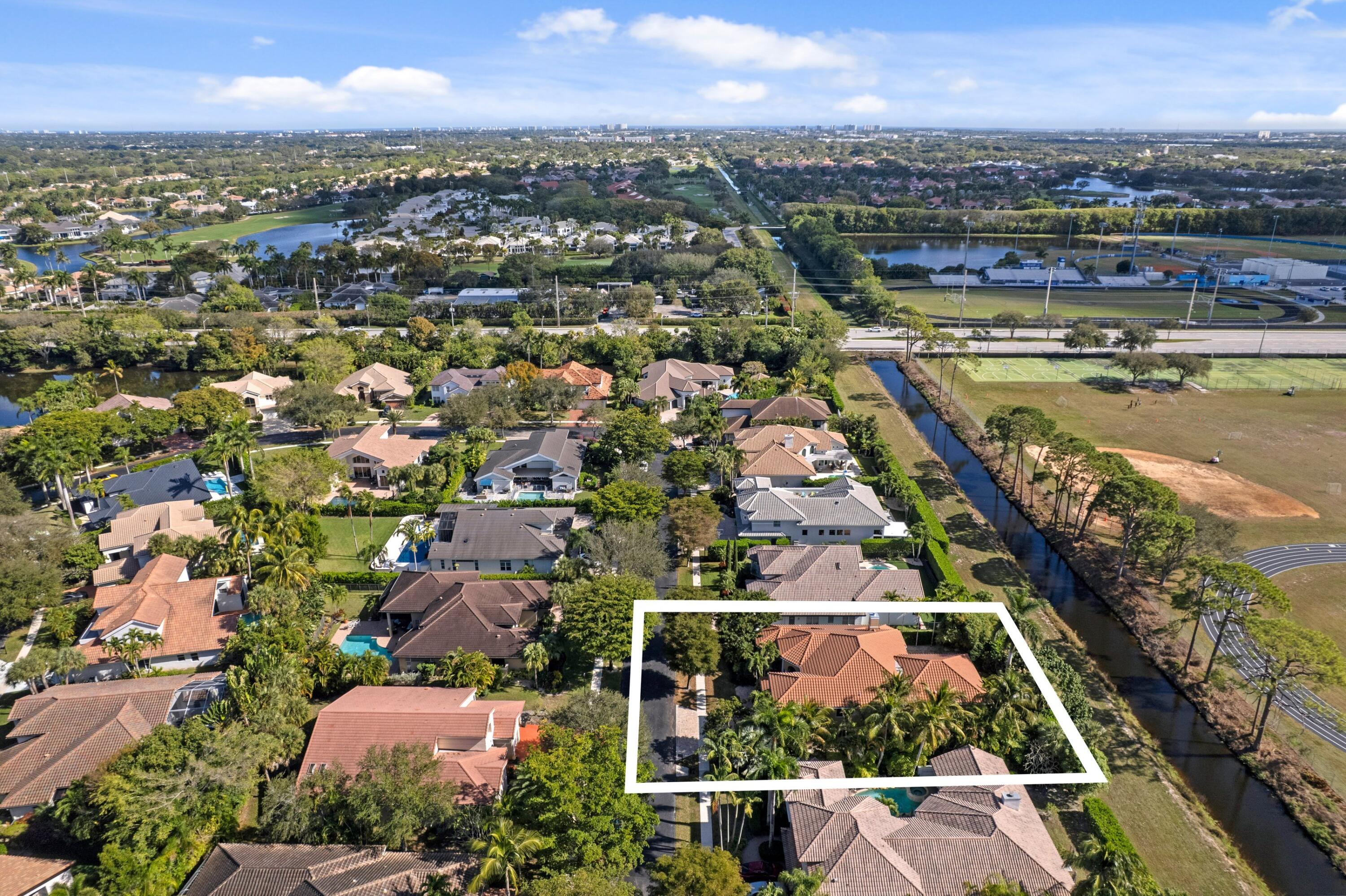 3054 Northwest 60th Street Boca Raton, FL 33496 - Photo 24 of 48 an aerial view of a city