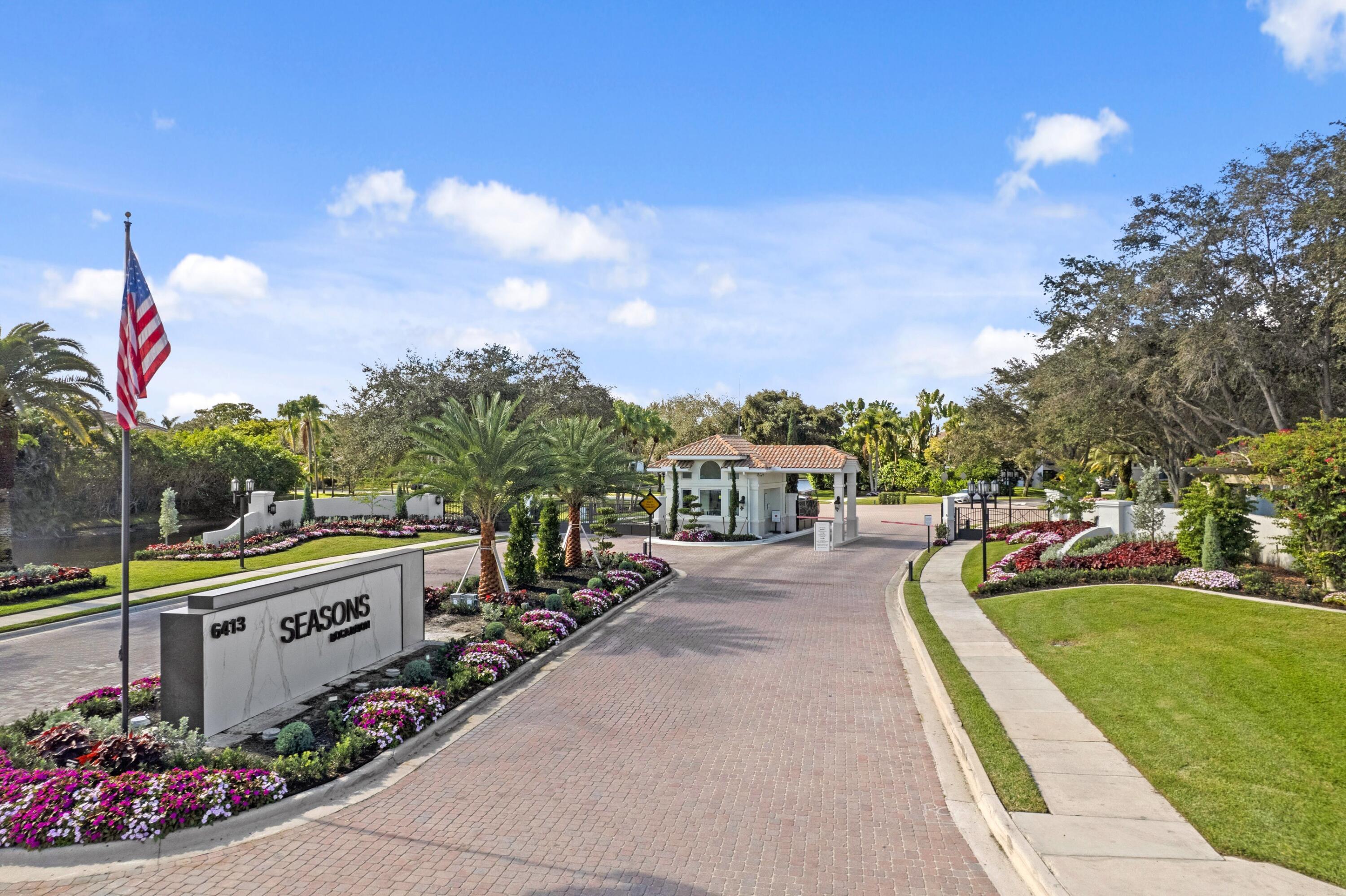 3054 Northwest 60th Street Boca Raton, FL 33496 - Photo 35 of 48 a view of a lake with a house in the background