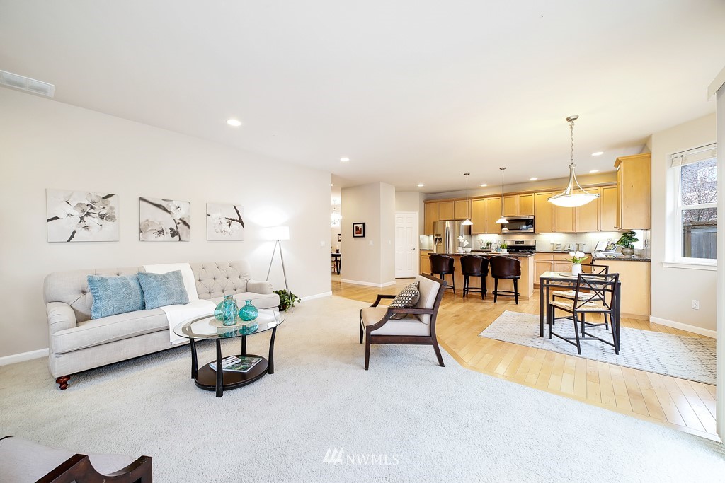 23606 17th Avenue West Bothell, WA 98021 - Photo 12 of 28 a living room with furniture and view of kitchen