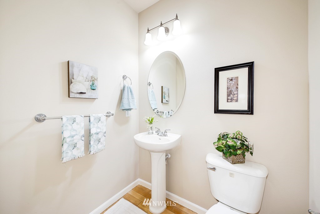 23606 17th Avenue West Bothell, WA 98021 - Photo 13 of 28 a bathroom with a toilet sink and mirror
