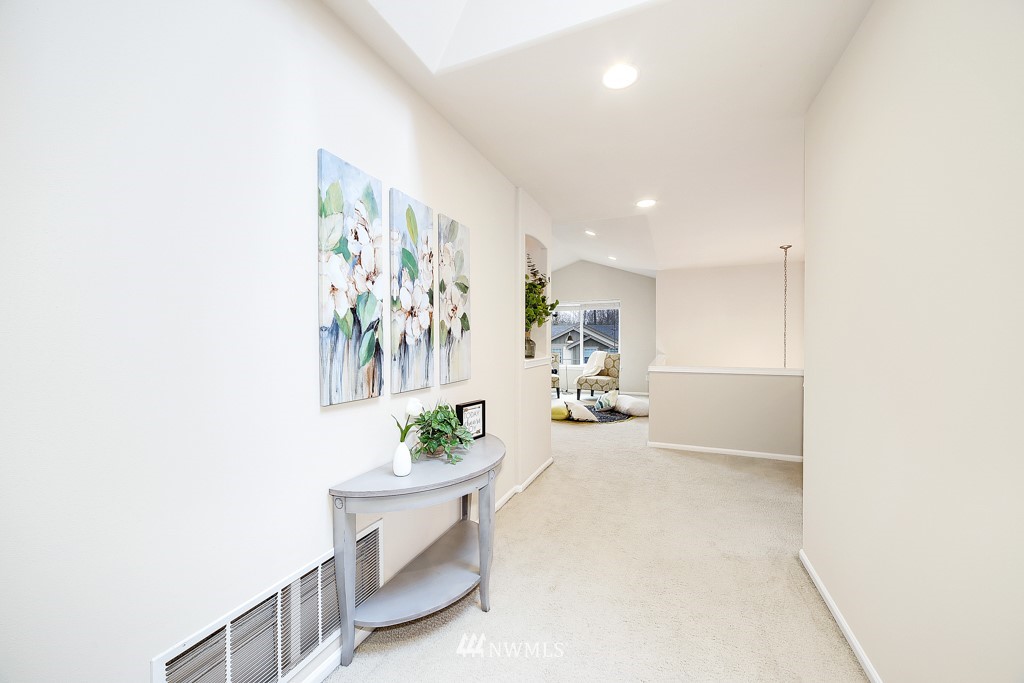 23606 17th Avenue West Bothell, WA 98021 - Photo 22 of 28 a view of a hallway with dining area
