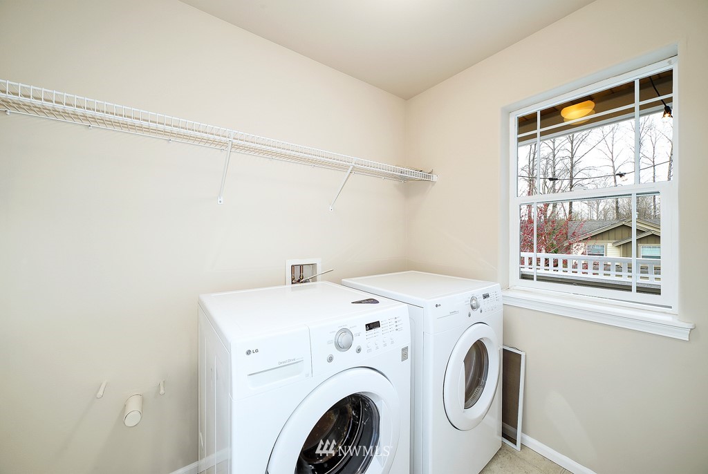 23606 17th Avenue West Bothell, WA 98021 - Photo 25 of 28 a utility room with dryer and washer