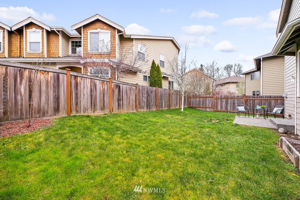 23606 17th Avenue West Bothell, WA 98021 - Photo 26 of 28 a view of a house with backyard and porch