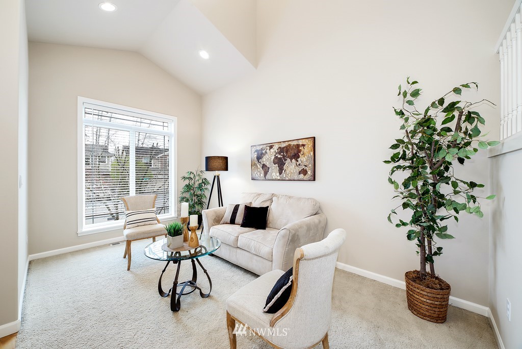 23606 17th Avenue West Bothell, WA 98021 - Photo 4 of 28 a living room with furniture and a potted plant