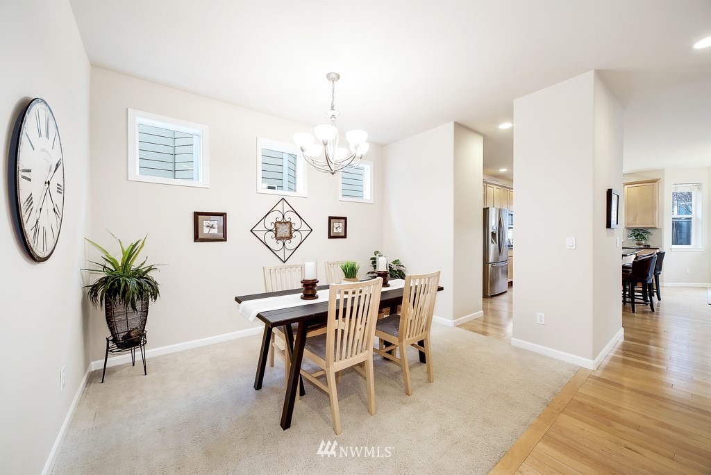 23606 17th Avenue West Bothell, WA 98021 - Photo 5 of 28 a view of a livingroom with furniture window and wooden floor