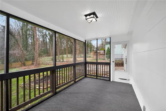 a view of staircase with window