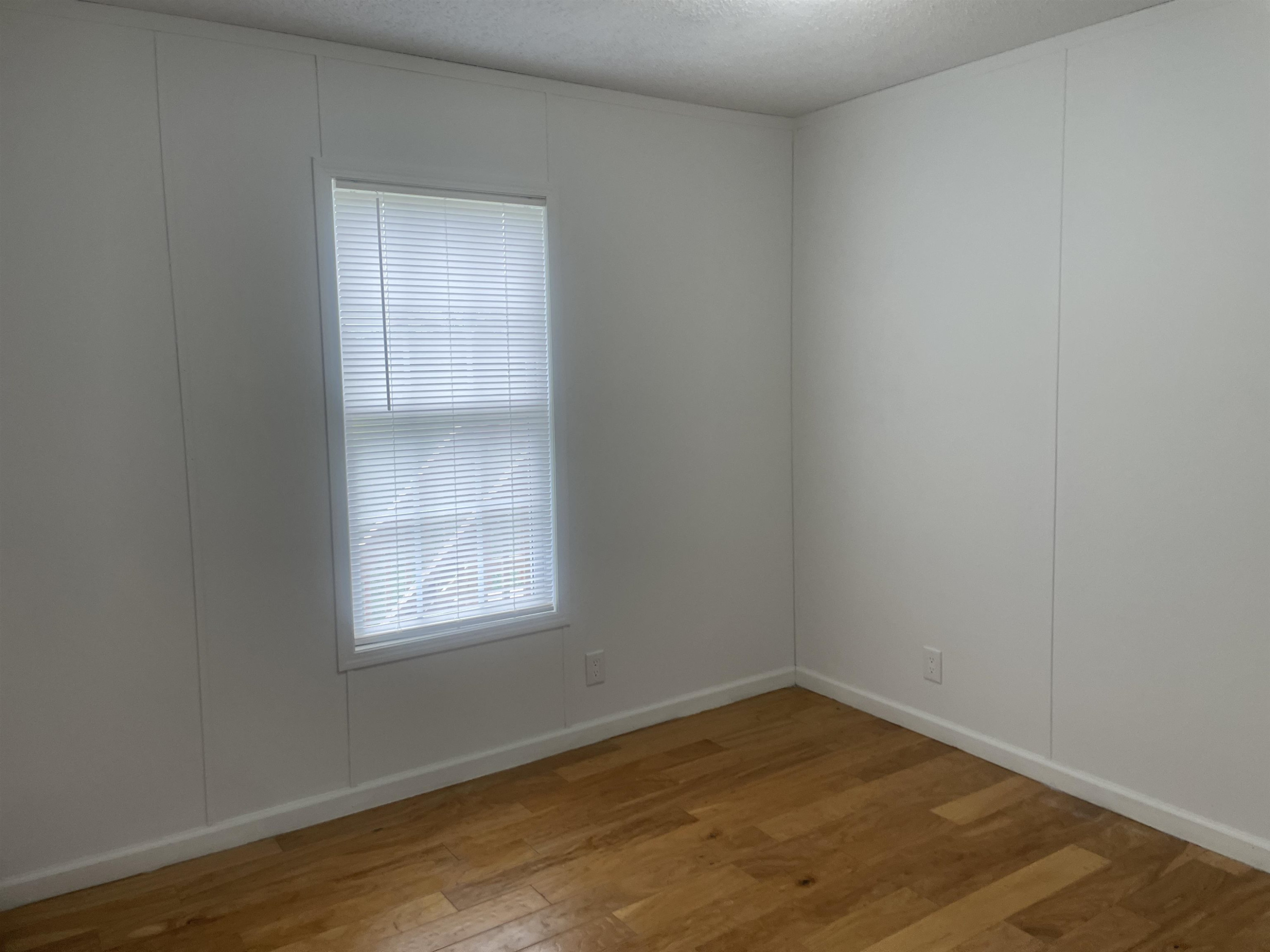 1175 Lott Road Henderson, TN 38340 - Photo 13 of 22 an empty room with a window