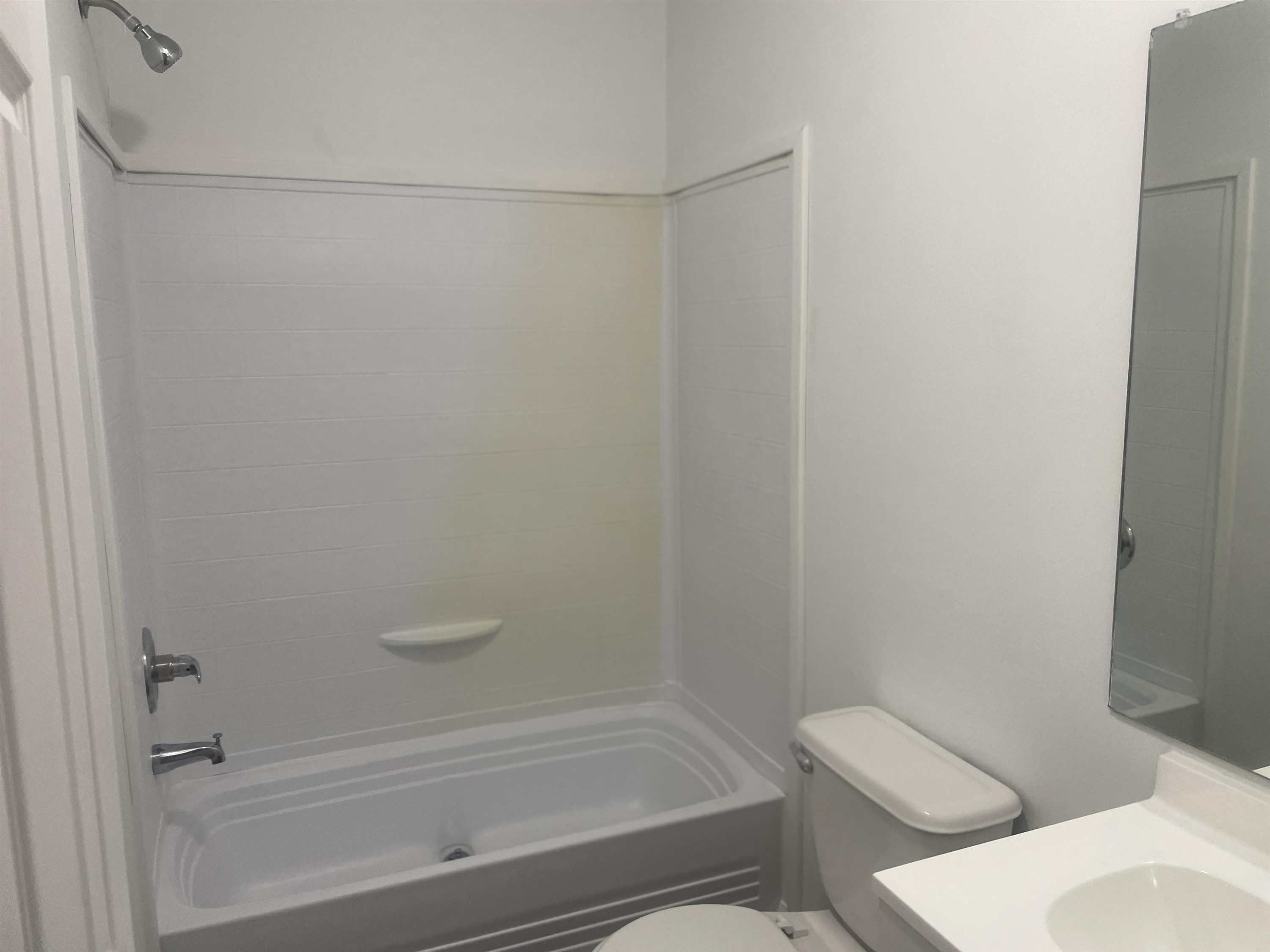 1175 Lott Road Henderson, TN 38340 - Photo 15 of 22 a bathroom with a toilet and a shower
