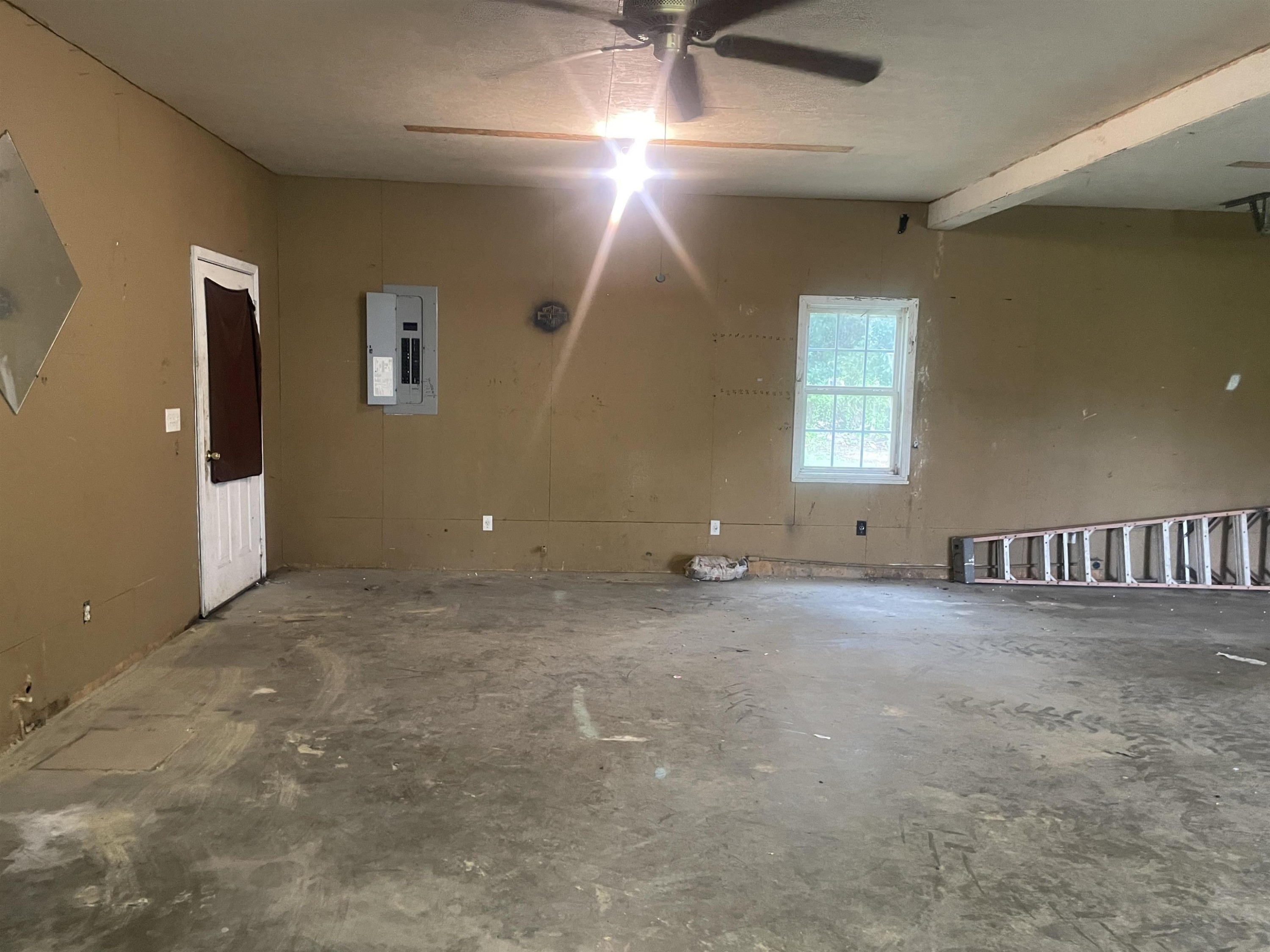 1175 Lott Road Henderson, TN 38340 - Photo 19 of 22 a view of an empty room with a window