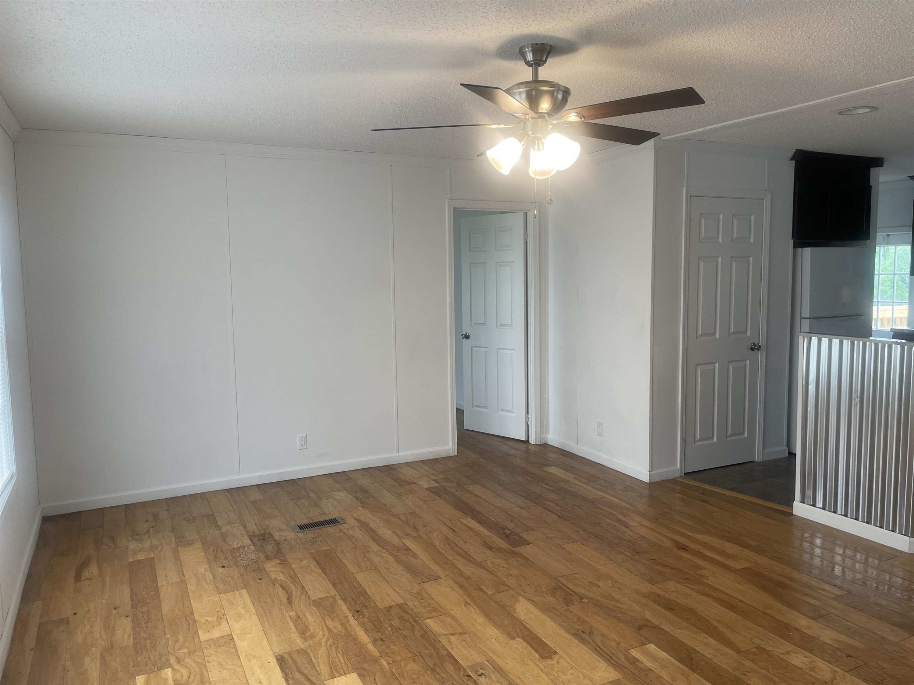 1175 Lott Road Henderson, TN 38340 - Photo 2 of 22 wooden floor in an empty room