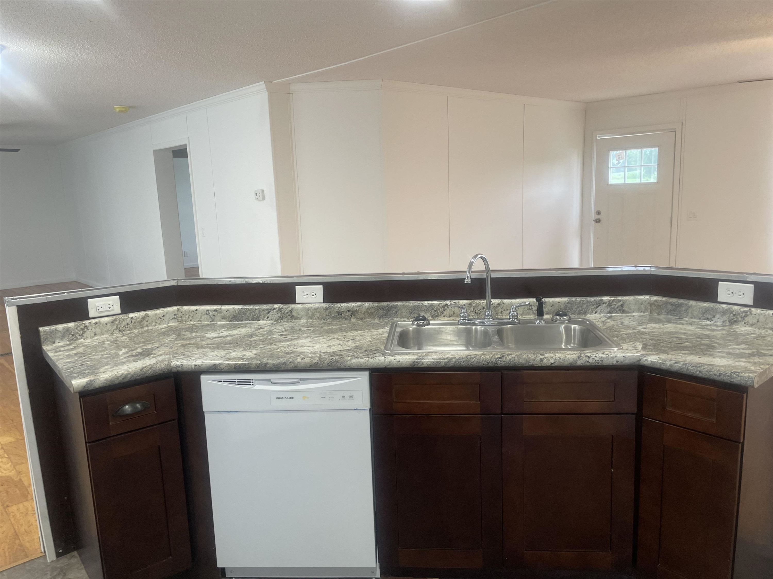 1175 Lott Road Henderson, TN 38340 - Photo 3 of 22 a bathroom with a granite countertop sink and a mirror