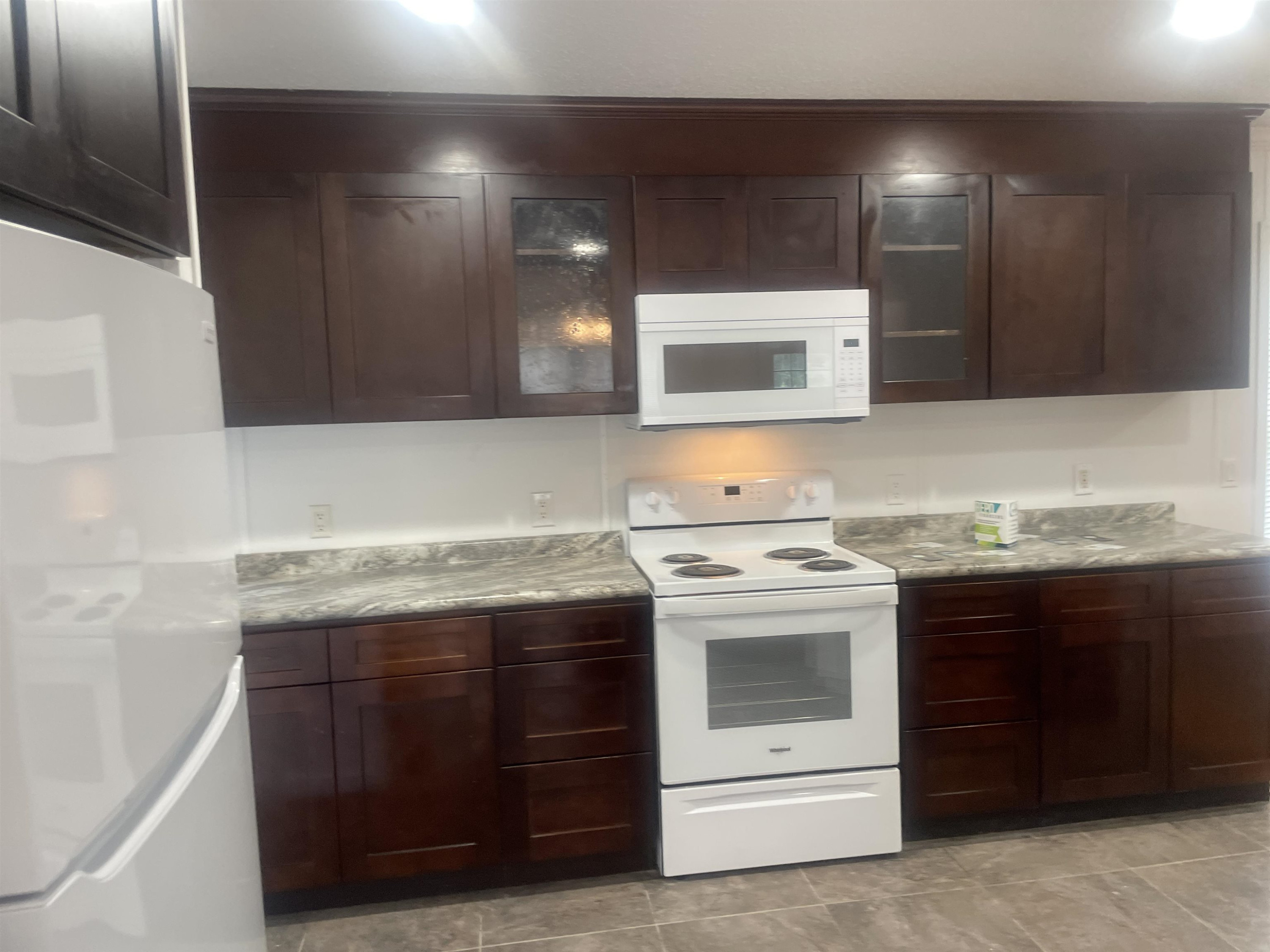 1175 Lott Road Henderson, TN 38340 - Photo 4 of 22 a kitchen with a stove and a sink