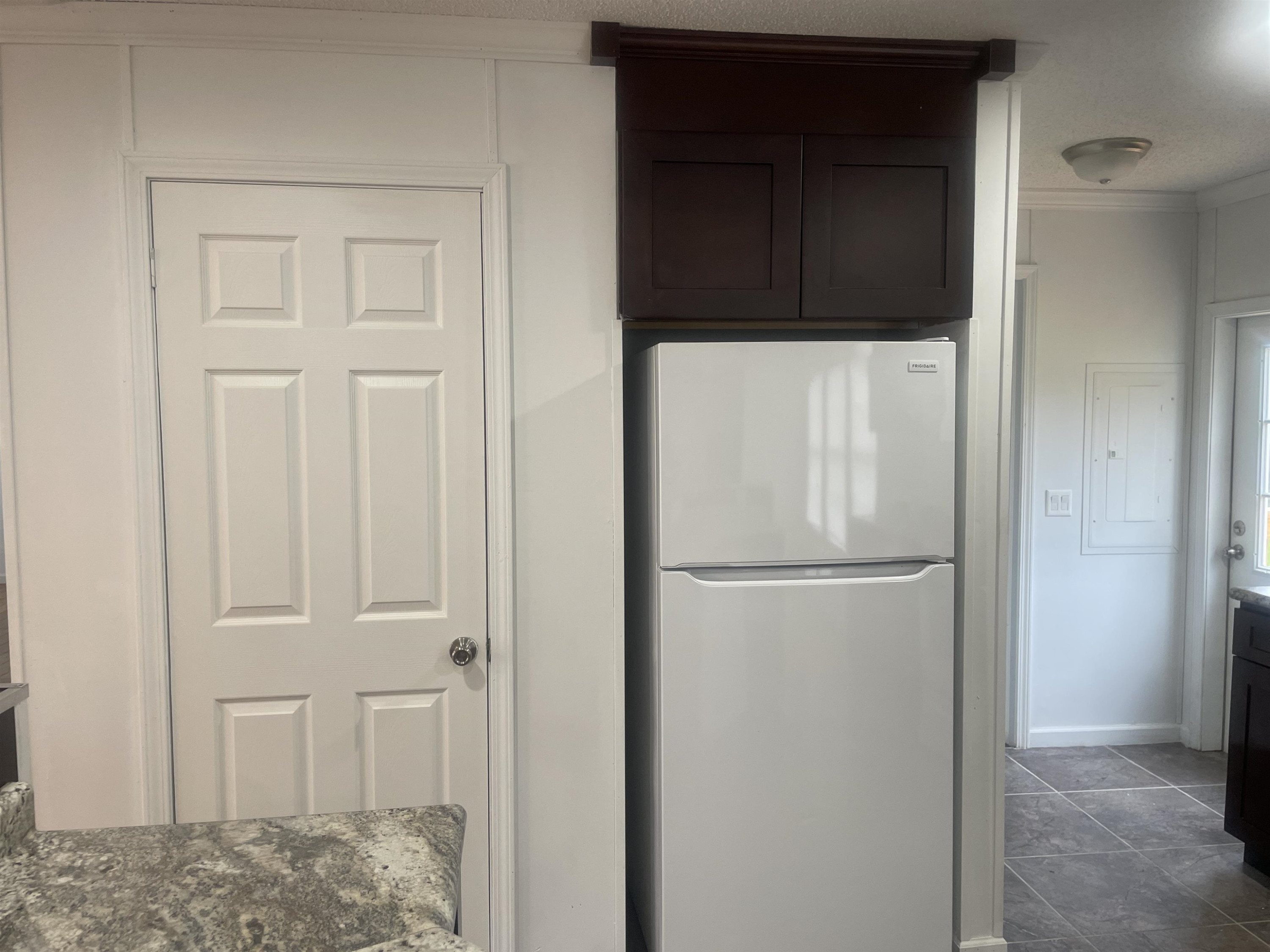 1175 Lott Road Henderson, TN 38340 - Photo 5 of 22 a white refrigerator freezer and a microwave