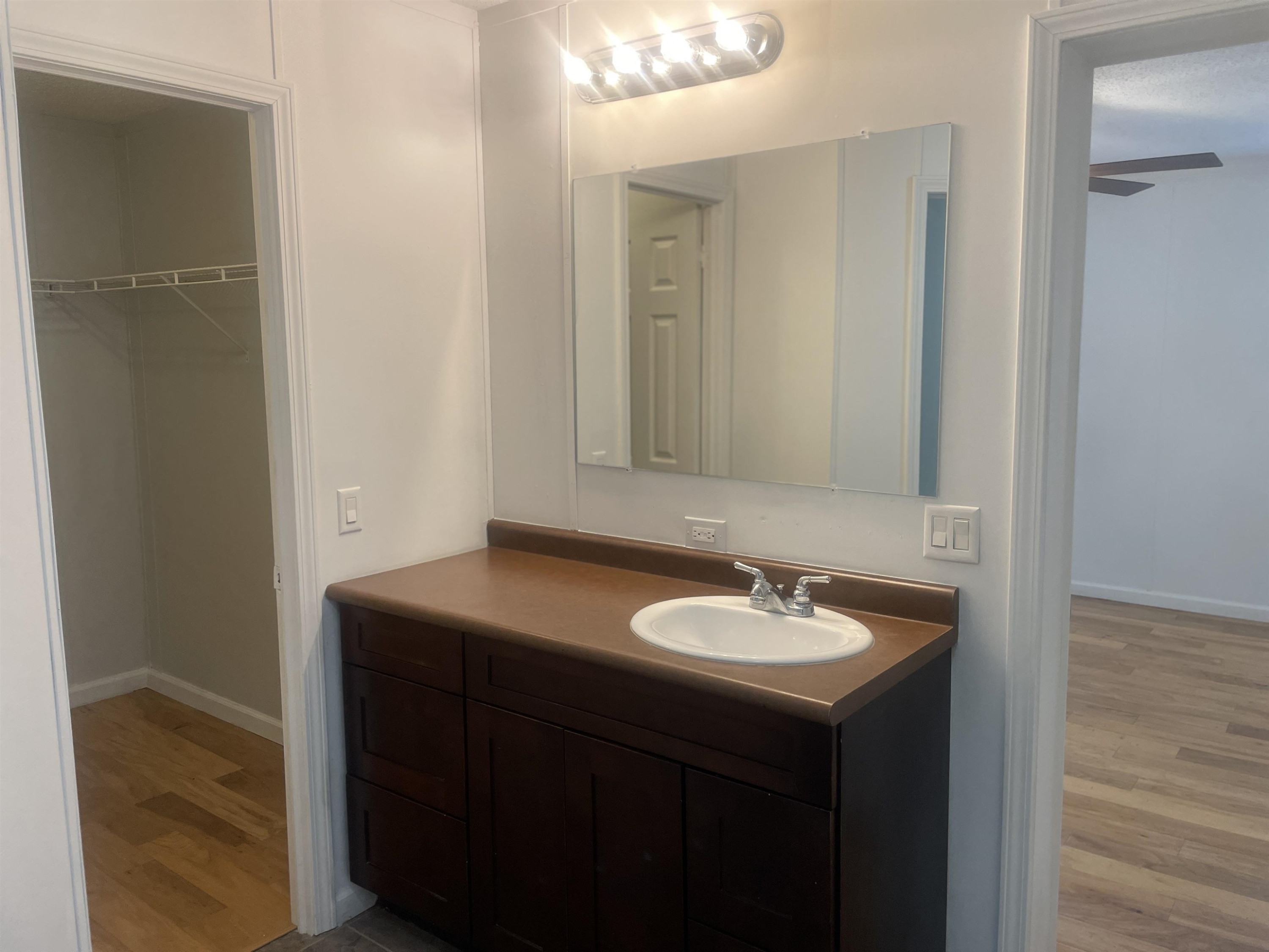 1175 Lott Road Henderson, TN 38340 - Photo 10 of 22 a bathroom with a sink and a mirror