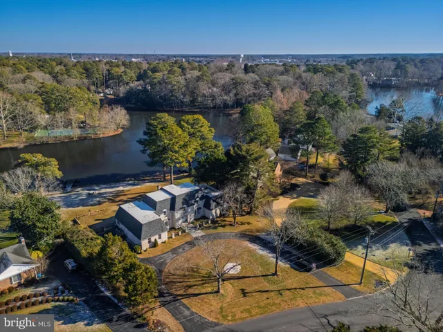 a view of a lake with a house
