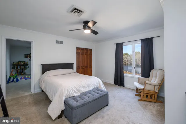 a bathroom with a double vanity sink and mirror