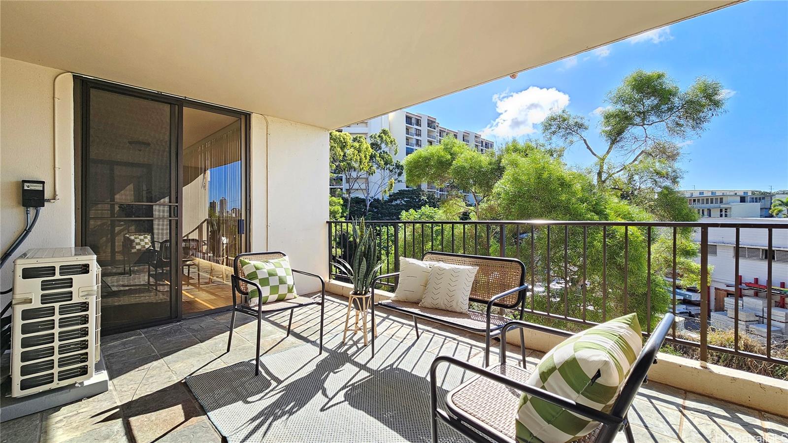 3138 Waialae Avenue, Unit 422 Honolulu, HI 96816 - Photo 15 of 25 a view of a chairs and table in the balcony