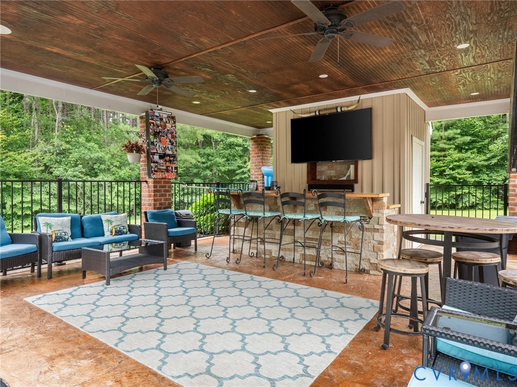12710 Ivey Mill Road Chesterfield, VA 23838 - Photo 5 of 57 Expansive covered outdoor living space featuring a