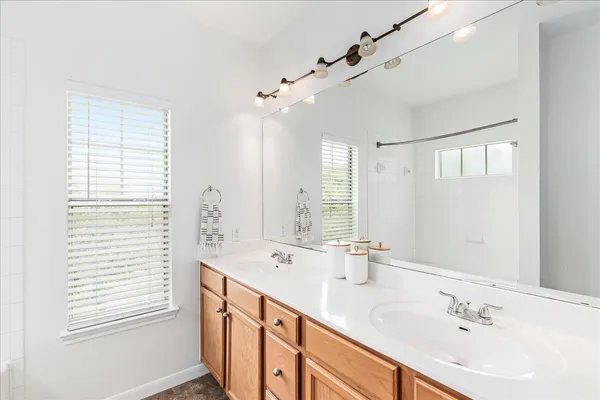 a bathroom with a bathtub and toilet