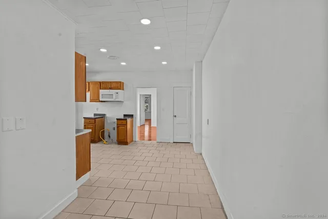 a view of a living room with furniture