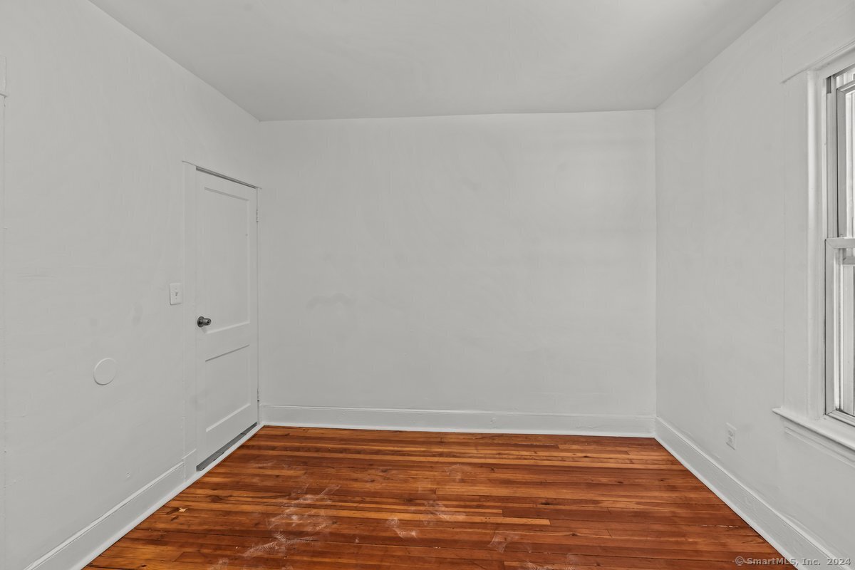 56 Blake Street, Unit 2 New Haven, CT 06511 - Photo 14 of 16 a view of a room with wooden floor