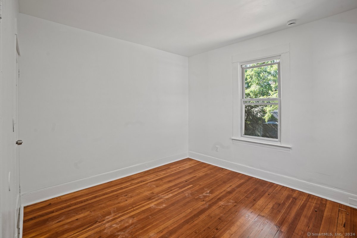 56 Blake Street, Unit 2 New Haven, CT 06511 - Photo 16 of 16 a view of a room with wooden floor and window
