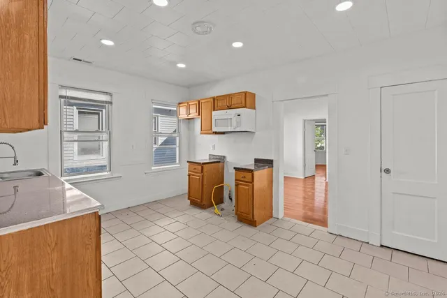 a view of kitchen and windows