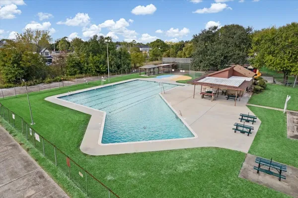 an aerial view of a house having yard