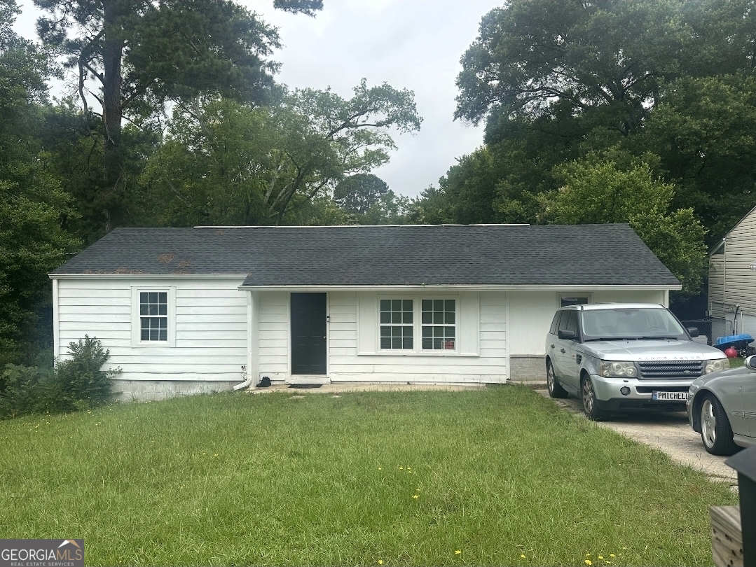 a house view with a garden space