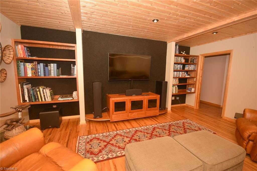 1047 Radhas Way Sandy Ridge, NC 27046 - Photo 13 of 30 There's room for a very large television.