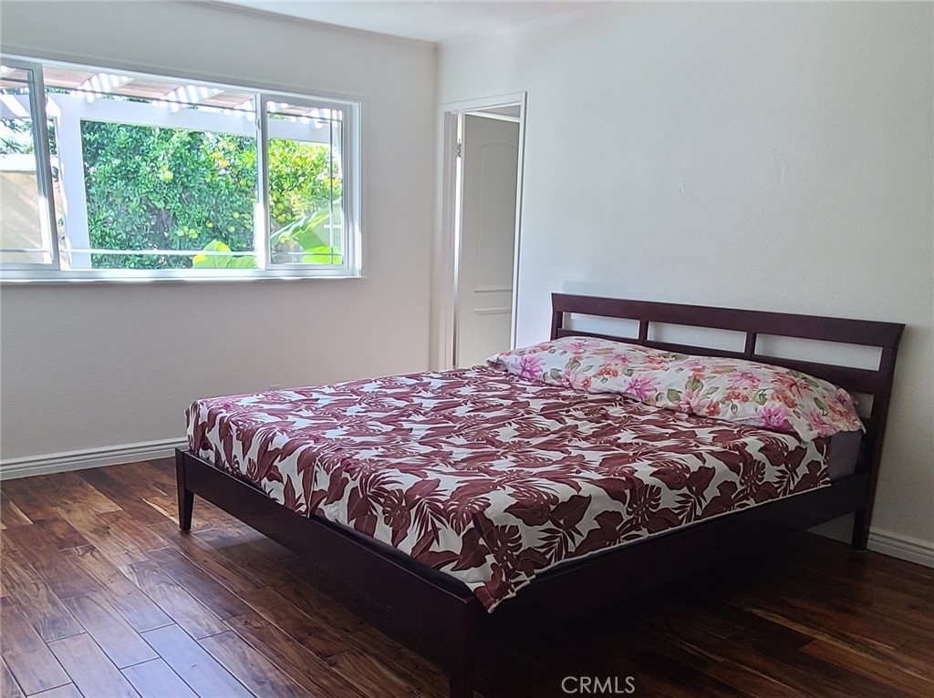 719 Cobb Avenue Placentia, CA 92870 - Photo 15 of 18 a bed sitting in a bedroom next to a window