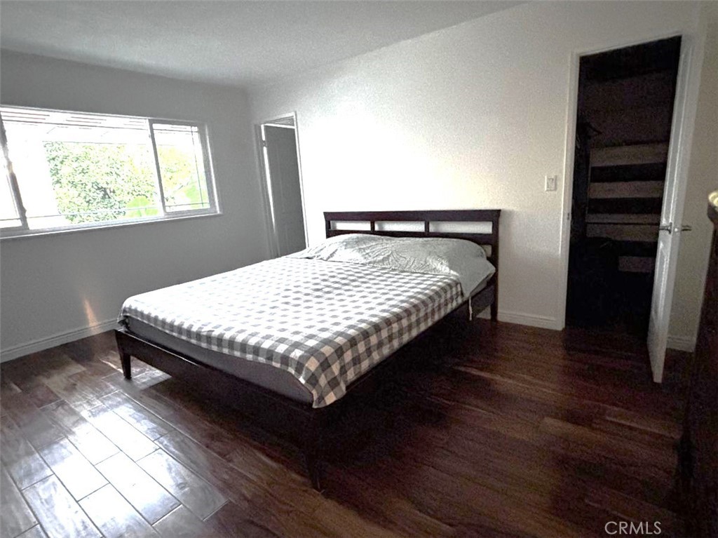 719 Cobb Avenue Placentia, CA 92870 - Photo 16 of 18 a bed sitting in a bedroom next to a window