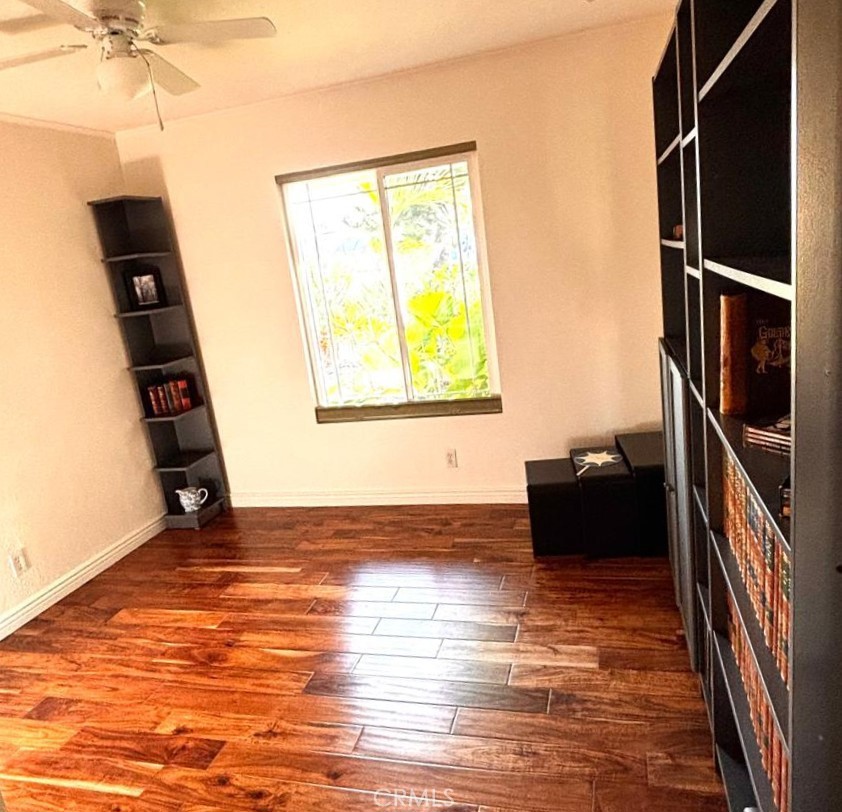 719 Cobb Avenue Placentia, CA 92870 - Photo 17 of 18 a view of a room with wooden floor and a window