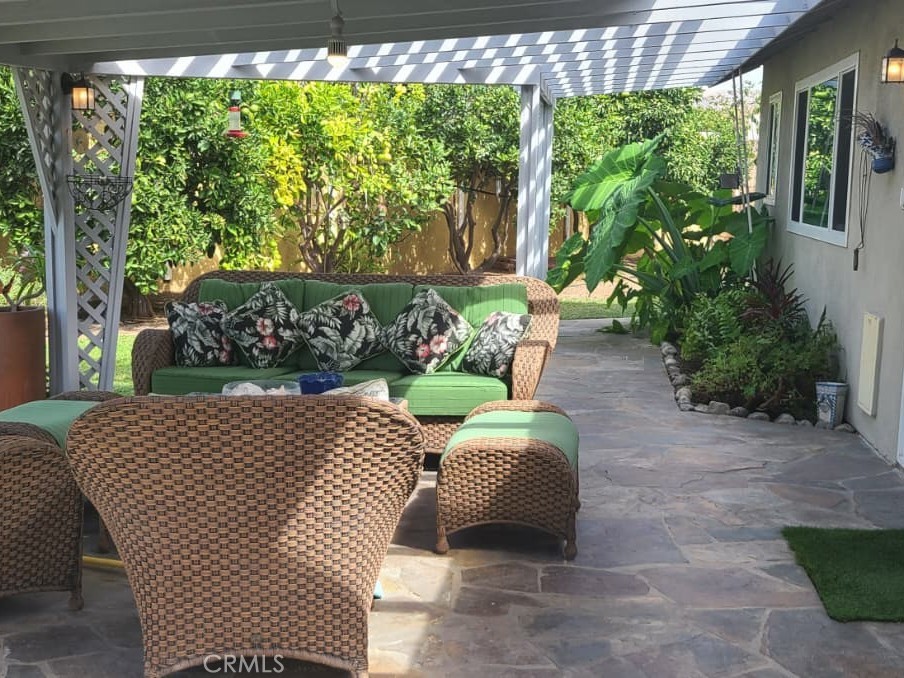 719 Cobb Avenue Placentia, CA 92870 - Photo 2 of 18 a wooden bench sitting in front of a building