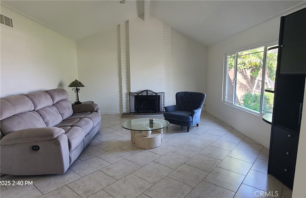 719 Cobb Avenue Placentia, CA 92870 - Photo 4 of 18 a living room with furniture and a large window