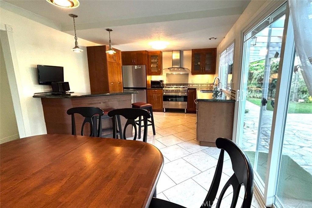 719 Cobb Avenue Placentia, CA 92870 - Photo 8 of 18 a view of a dining room with furniture window and outside view