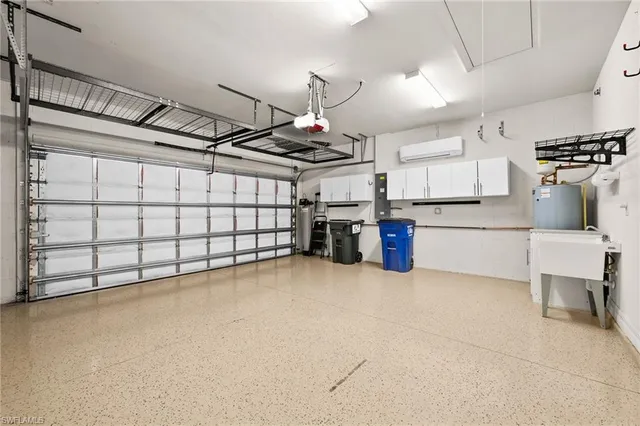 a view of a storage & utility room with a sink