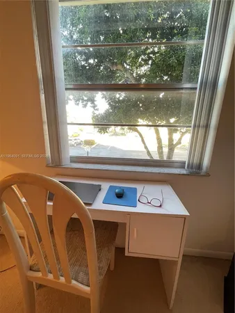 a view of a window with an outdoor space