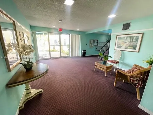 a view of a livingroom with furniture